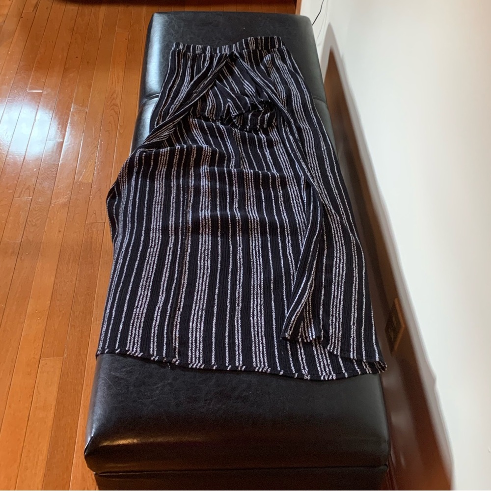 Macy’s surf gypsy black & white shorts with long train in back that wraps around